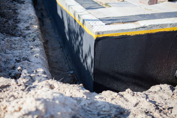 Professional Interior Drainage System technician working in Columbus, IN